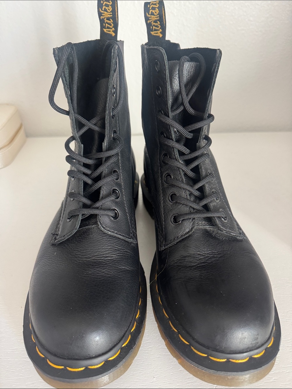Dr. Martens Black Leather 8-Eye Lace-Up Boots with Yellow Welt Stitching